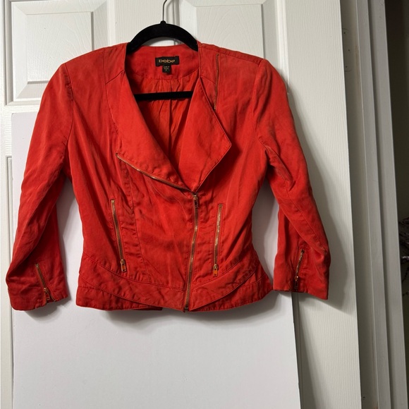 bebe Jackets & Blazers - Bebe jacket, zero, burnt orange, zip front, zip pockets, straight sleeves ex con